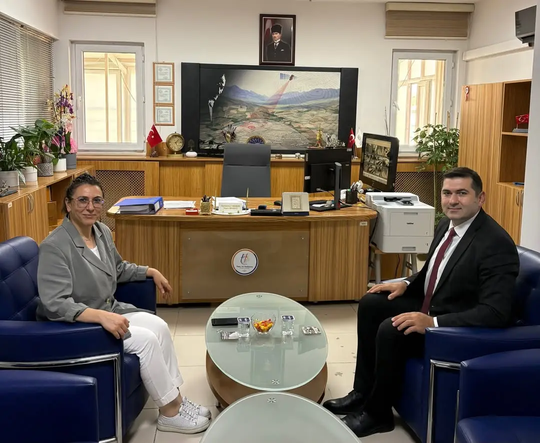 Afyonkarahisar Sosyal Güvenlik İl Müdürü Süleyman Çelikbaş, Afyonkarahisar Tapu Müdürü Havvanur Cengiz'i Ziyaret Etti